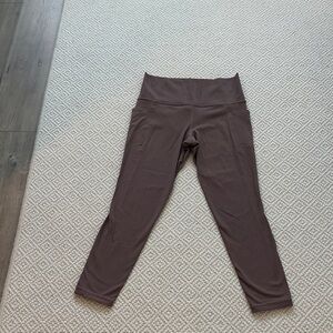 Athleta Salutation 7/8 tights in powervita in size S.